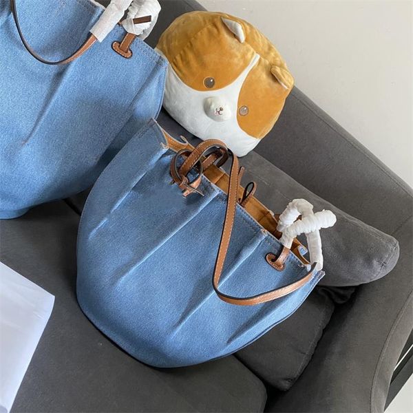 2021 denim lining matchs withs the aureate suede shopping bags leather handbags with a solid base and soft half
2021 denim lining matchs withs the aureate suede shopping bags leather handbags with a solid base and soft half