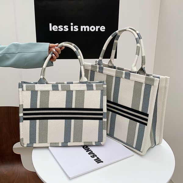 luxury handbags hand carry canvas women 2021 new stripe large capacity bag versatile single shoulder underarm tote bag
luxury handbags hand carry canvas women 2021 new stripe large capacity bag versatile single shoulder underarm tote bag
