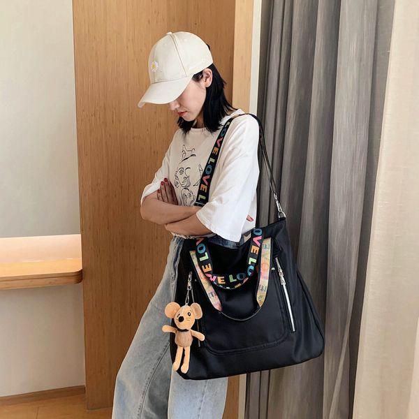 nylon cloth big fashionable portable single shoulder large capacity leisure messenger women's bag versatile trend
nylon cloth big fashionable portable single shoulder large capacity leisure messenger women's bag versatile trend