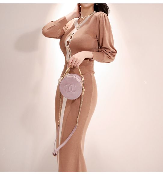 two piece dress sweater sets autumn winter 2 pc suit women buttons front knitted cardigan coat+mid-calf knitting ski, White
two piece dress sweater sets autumn winter 2 pc suit women buttons front knitted cardigan coat+mid-calf knitting ski, White