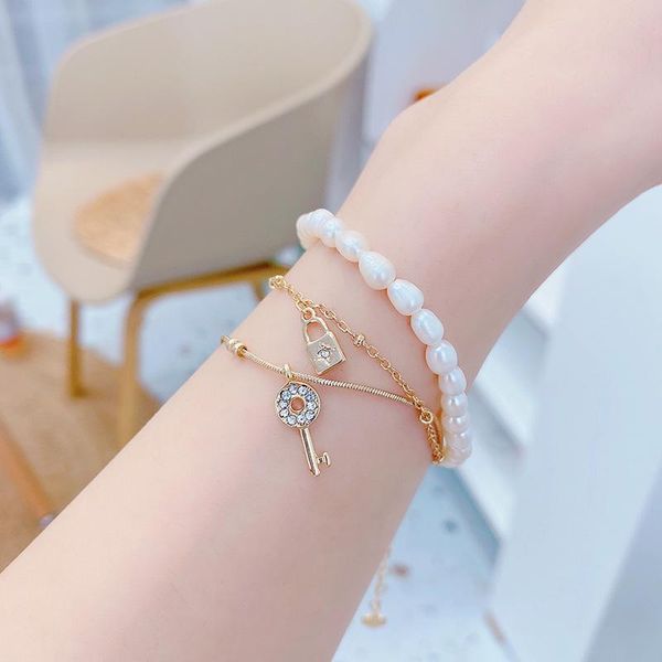 charm bracelets korea design fashion jewelry multilayer freshwater pearl chain key lock pendant bracelet elegant women's daily accessor, Golden;silver
charm bracelets korea design fashion jewelry multilayer freshwater pearl chain key lock pendant bracelet elegant women's daily accessor, Golden;silver