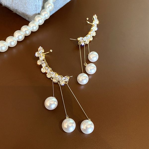 925 silver needle integrated pearl tassel ear clip fashion simple temperament earrings personalized court style earrings
925 silver needle integrated pearl tassel ear clip fashion simple temperament earrings personalized court style earrings