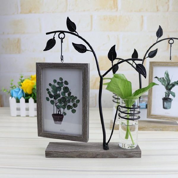 wrought iron solid wood hydroponic suspension double-sided po frame creative personality decorative platform crafts ornaments frames
wrought iron solid wood hydroponic suspension double-sided po frame creative personality decorative platform crafts ornaments frames