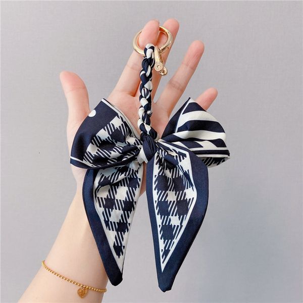 color creative scarf key chain bag pendant horseshoe car anti loss ribbon bow accessories, Silver
color creative scarf key chain bag pendant horseshoe car anti loss ribbon bow accessories, Silver
