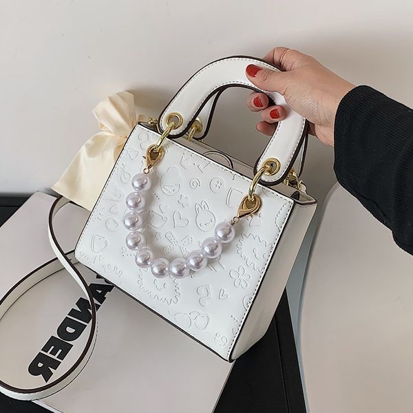 small bag female 2021 new fashion pearl hand korean embossed princess texture one shoulder messenger bag
small bag female 2021 new fashion pearl hand korean embossed princess texture one shoulder messenger bag