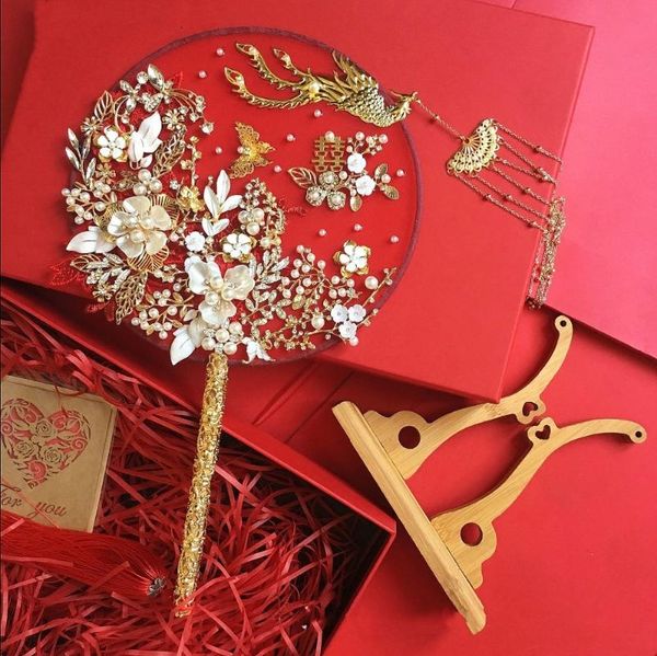 wedding flowers janevini luxury gold phoenix chinese bridal hand bouquets fan type artificial pearls metal jewelry accessories
wedding flowers janevini luxury gold phoenix chinese bridal hand bouquets fan type artificial pearls metal jewelry accessories