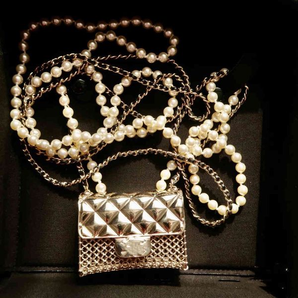 vintage chain wedding pearl double layer mini diagonal metal medium heavy industry small square bag necklace, Silver
vintage chain wedding pearl double layer mini diagonal metal medium heavy industry small square bag necklace, Silver