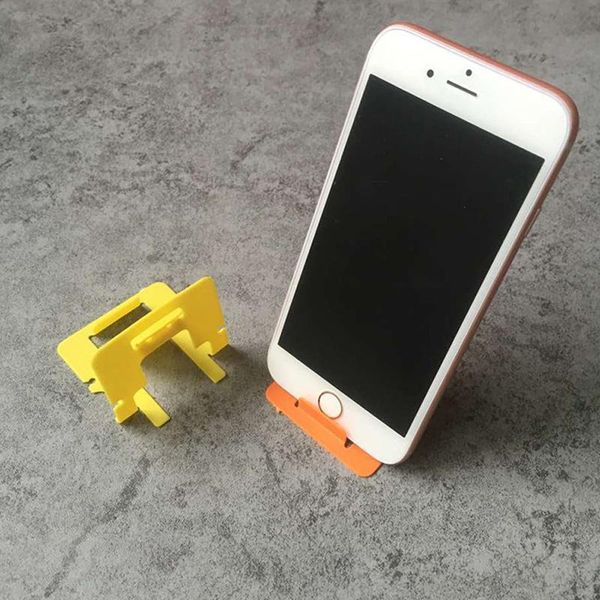 100pcs lazy folding portable simple mobile phone universal bracket business card accessories cell mounts & holders
100pcs lazy folding portable simple mobile phone universal bracket business card accessories cell mounts & holders