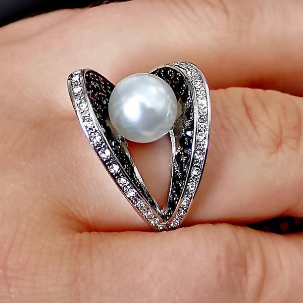 vintage female white pearl big ring charm silver color engagement luxury cross zircon wedding rings for women, Slivery;golden
vintage female white pearl big ring charm silver color engagement luxury cross zircon wedding rings for women, Slivery;golden