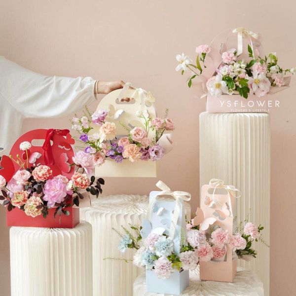 gift wrap 10pcs/lot portable paper flower basket butterfly box cute kraft handbag wedding rose party packaging
gift wrap 10pcs/lot portable paper flower basket butterfly box cute kraft handbag wedding rose party packaging