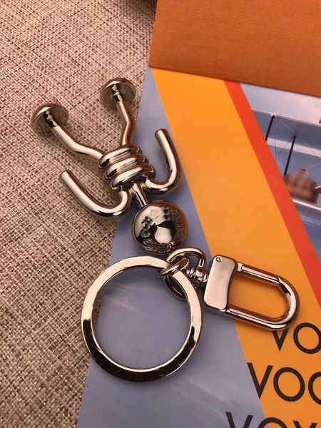 2021 fasion luxury designer keychain car key chain men women bag pendant accessories with box 2 options good nice, Silver
2021 fasion luxury designer keychain car key chain men women bag pendant accessories with box 2 options good nice, Silver