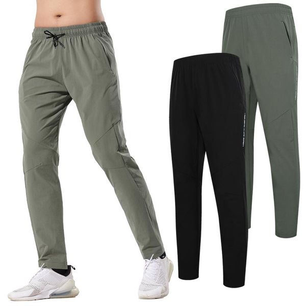 men running sweatpant letter printing quick dry gym trousers zipper pockets drawstring sportwear 2021 male training pants, Black;blue
men running sweatpant letter printing quick dry gym trousers zipper pockets drawstring sportwear 2021 male training pants, Black;blue