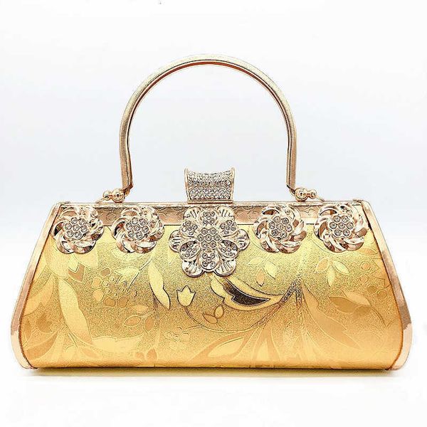 metal inlaid diamond lock cheongsam lady's dinner bag princs hand with sand zipper bag
metal inlaid diamond lock cheongsam lady's dinner bag princs hand with sand zipper bag