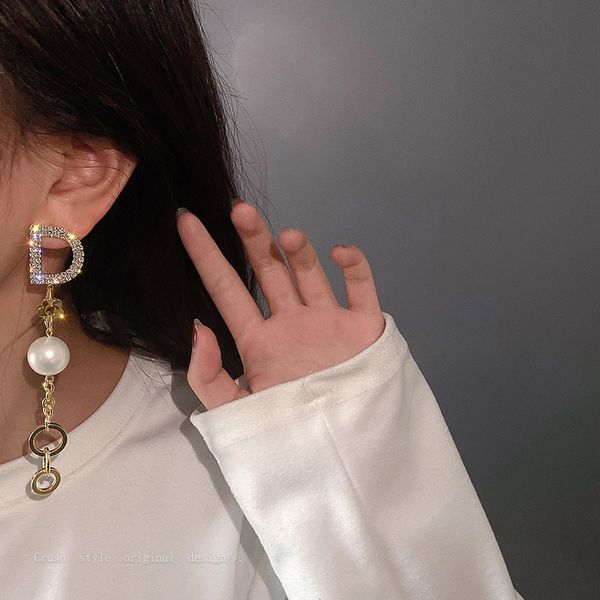 925 silver needle flower inlaid with diamond pearl letter d tassel earrings cool wind net red temperament fashion earrings
925 silver needle flower inlaid with diamond pearl letter d tassel earrings cool wind net red temperament fashion earrings