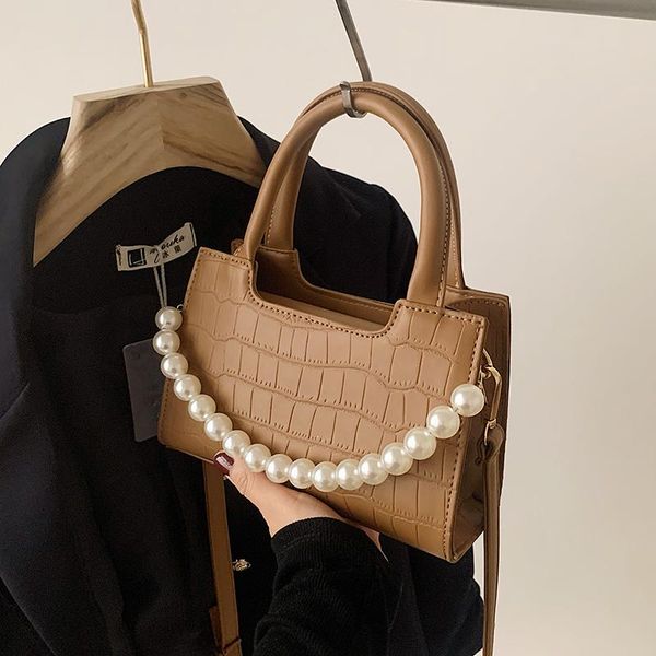 niche design high-end bag female 2021 fashion messenger all-match pearl handbag square shoulder width: 20cm bags
niche design high-end bag female 2021 fashion messenger all-match pearl handbag square shoulder width: 20cm bags