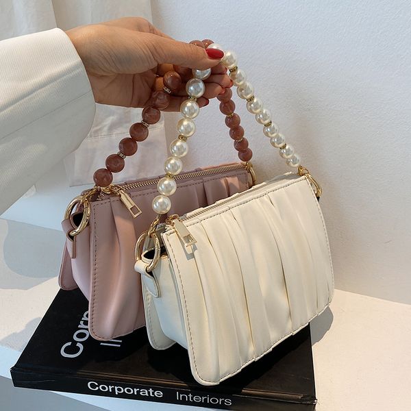 niche design handbags all-match 2021 new fashion messenger bag pearl portable square bag shoulder bag width 20cm
niche design handbags all-match 2021 new fashion messenger bag pearl portable square bag shoulder bag width 20cm