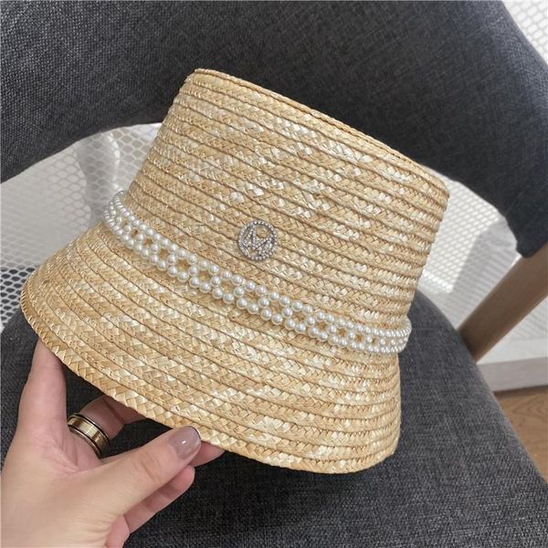wide brim hats 202106-shi summer handmade straw pearl ribbon m letter lady bucket cap women leisure hat, Blue;gray
wide brim hats 202106-shi summer handmade straw pearl ribbon m letter lady bucket cap women leisure hat, Blue;gray