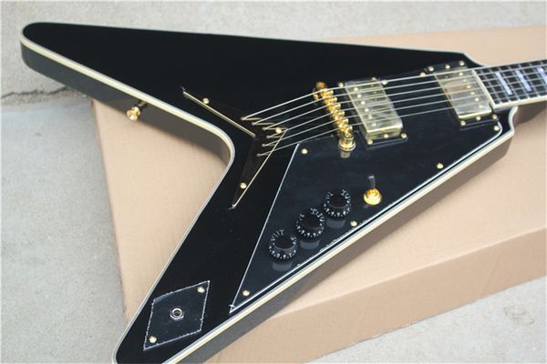 rare trans black flame maple flying v electric guitar string thru body bridge, black pickguard, gold hardware, white mop block inlay
rare trans black flame maple flying v electric guitar string thru body bridge, black pickguard, gold hardware, white mop block inlay