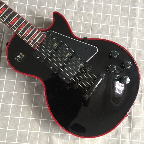 sell custom electric guitar classic black color mahogany rosewood fingerboard red binding can come to figure
sell custom electric guitar classic black color mahogany rosewood fingerboard red binding can come to figure