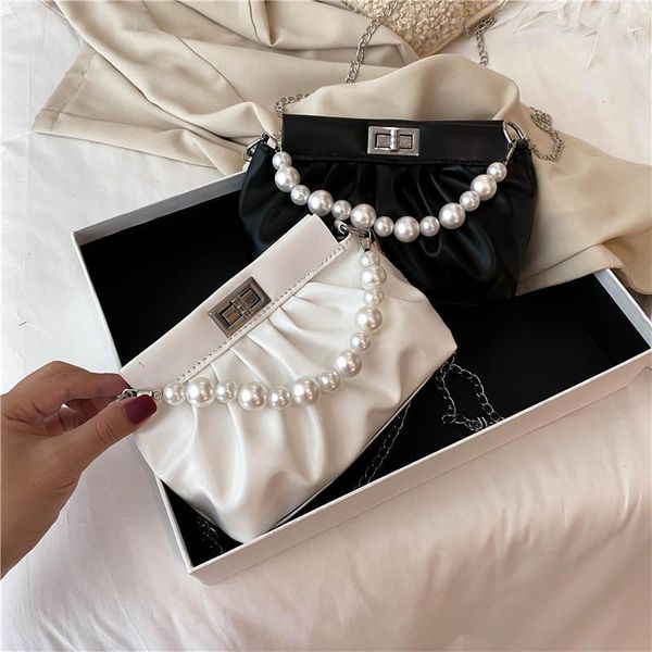 fairy bag 2021 spring and summer tide korean solid color shoulder bags fold pearl fashion armpit
fairy bag 2021 spring and summer tide korean solid color shoulder bags fold pearl fashion armpit