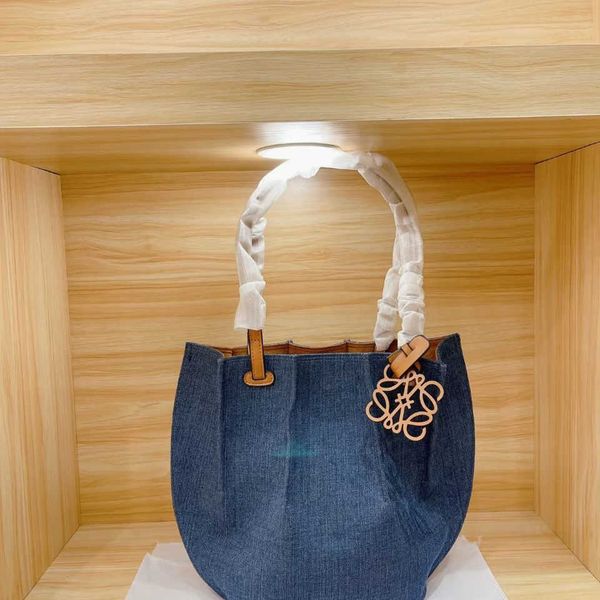 net red same fashion canvas denim pleated tote bag one shoulder hand large capacity women 2021 new hand zly
net red same fashion canvas denim pleated tote bag one shoulder hand large capacity women 2021 new hand zly