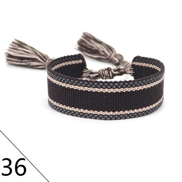 link, chain 2021 woven friendship bracelet for women handmade braided bracelets with tassel print embroidery wholesale jewelry, Black
link, chain 2021 woven friendship bracelet for women handmade braided bracelets with tassel print embroidery wholesale jewelry, Black