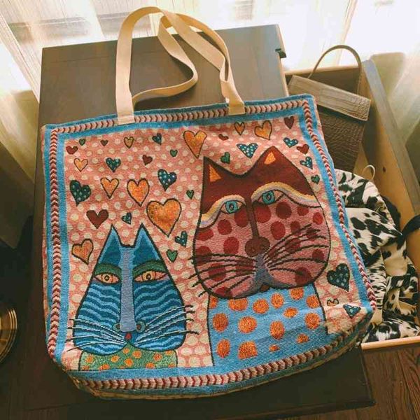 jacquard three-dimensional contrast color handmade large capacity green cat canvas shoulder bag
jacquard three-dimensional contrast color handmade large capacity green cat canvas shoulder bag