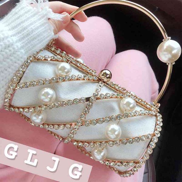 diamond party evening clutch for women pearl rhinestone designer hollow out purses and handbags wedding cage bag
diamond party evening clutch for women pearl rhinestone designer hollow out purses and handbags wedding cage bag