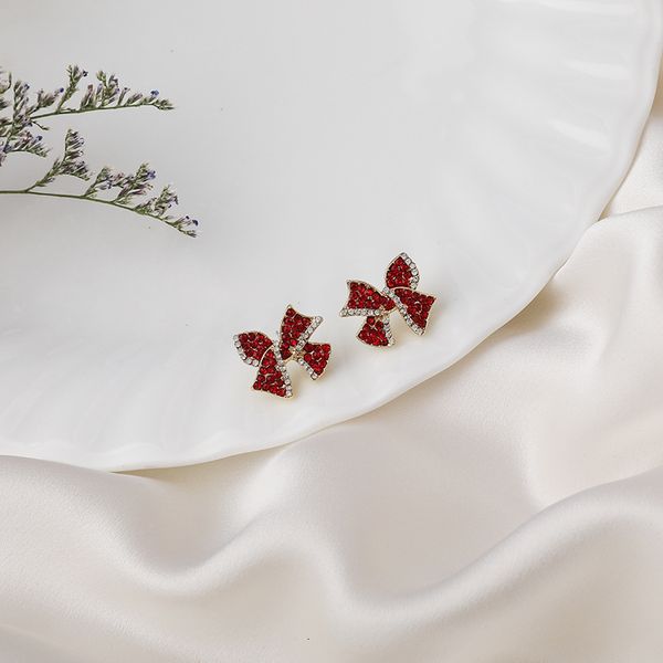 korean festive earrings fashion red diamond studded bow simple temperament sweet wind small female, Silver
korean festive earrings fashion red diamond studded bow simple temperament sweet wind small female, Silver