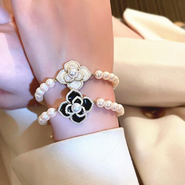 charm bracelets black white camellia flower bracelet for women girls 2021 fashion classic delicate pearl & bangle fine gifts, Golden;silver
charm bracelets black white camellia flower bracelet for women girls 2021 fashion classic delicate pearl & bangle fine gifts, Golden;silver