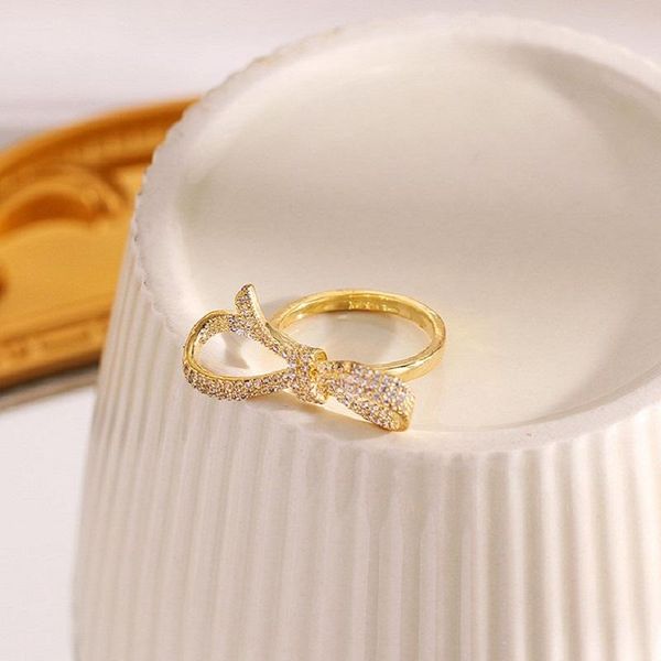 cluster rings creative novelty shaped bowknot opening delicate zircon for women personality fashion wedding party finger jewelry, Golden;silver
cluster rings creative novelty shaped bowknot opening delicate zircon for women personality fashion wedding party finger jewelry, Golden;silver