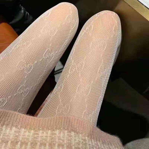 luxury brand double g letter tights black and white two-color stockings all-match nightclub fishnet pantyhose 
luxury brand double g letter tights black and white two-color stockings all-match nightclub fishnet pantyhose