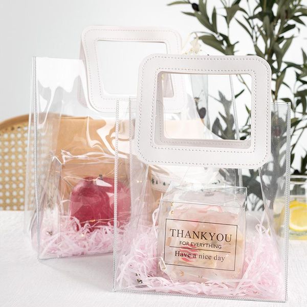 gift wrap 1pc transparent pvc handbag clear shopping bags wedding souvenir flower candy cookie christmas package supplies
gift wrap 1pc transparent pvc handbag clear shopping bags wedding souvenir flower candy cookie christmas package supplies