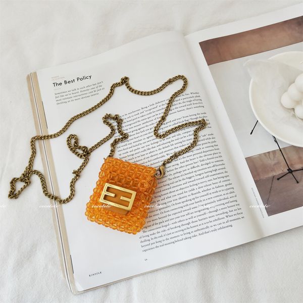 women bead small bag hand made chain beaded messenger handbag 2021 mini hanging neck earphone purse designer style fashion
women bead small bag hand made chain beaded messenger handbag 2021 mini hanging neck earphone purse designer style fashion