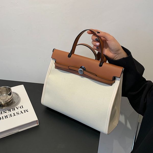 design popular large capacity women's summer 2021 new fashion messenger canvas bag texture portable tote bag
design popular large capacity women's summer 2021 new fashion messenger canvas bag texture portable tote bag