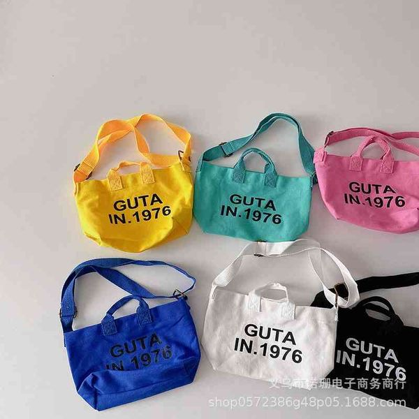 korea's same simple letter candy color children's canvas boys and girls baby concave shape single shoulder diagonal bag
korea's same simple letter candy color children's canvas boys and girls baby concave shape single shoulder diagonal bag