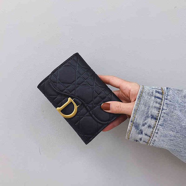2022 factory wholesale women's wallet women's simple fashion buckle folding stone multi card bag short style pocket change wallet, Red;black
2022 factory wholesale women's wallet women's simple fashion buckle folding stone multi card bag short style pocket change wallet, Red;black
