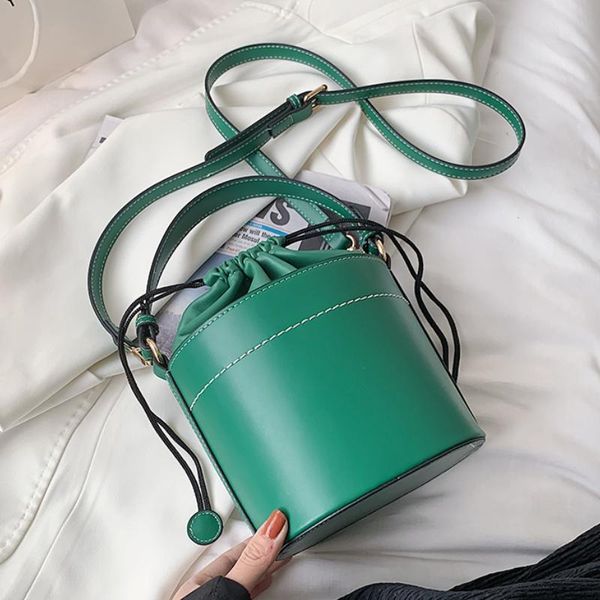 cross body tote bucket bag 2021 summer fashion high-quality pu leather women's designer handbag drawstring shoulder messenger
cross body tote bucket bag 2021 summer fashion high-quality pu leather women's designer handbag drawstring shoulder messenger