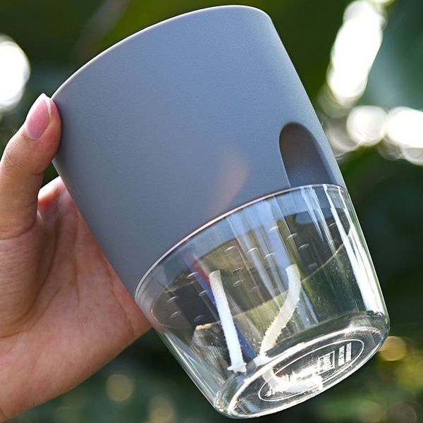 the transparent plastic flower pot has thes function of automatic water absorbent cotton rope giant flowers pots
the transparent plastic flower pot has thes function of automatic water absorbent cotton rope giant flowers pots