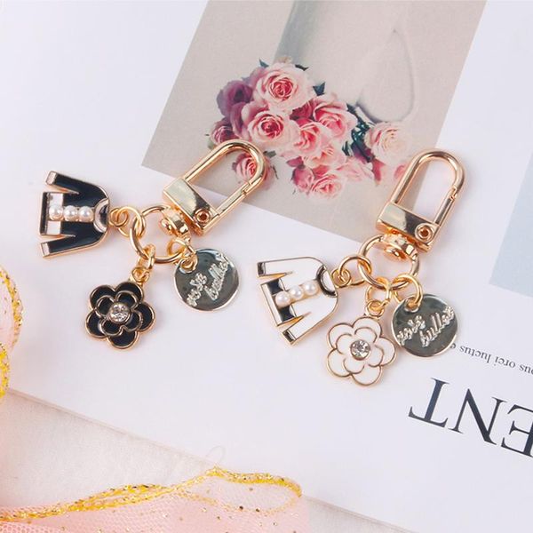 keychains enamel camellia clothes keychain for women pearl zircon car handbag key holder aesthetic trinket jewelry p198, Silver
keychains enamel camellia clothes keychain for women pearl zircon car handbag key holder aesthetic trinket jewelry p198, Silver