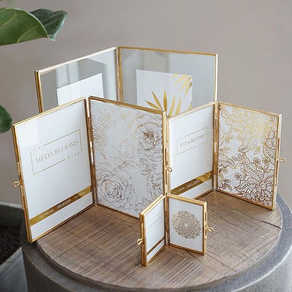 glass folding po frame home decoration metal picture gold copper strip double-sided furnishings artware frames
glass folding po frame home decoration metal picture gold copper strip double-sided furnishings artware frames
