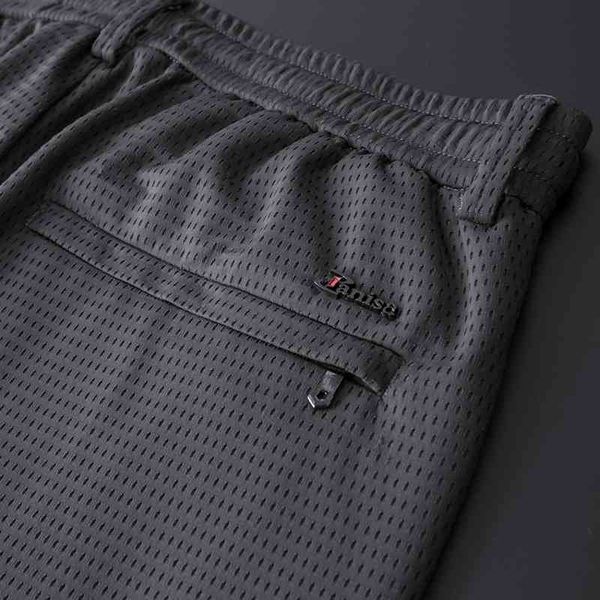 quality summer thin ice silk casual breathable loose mesh elastic men's quick drying air conditioning pants, Black
quality summer thin ice silk casual breathable loose mesh elastic men's quick drying air conditioning pants, Black