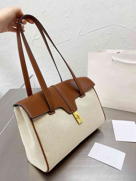 saijia soft tote airport hand carrying one shoulder fashionable large capacity bag canvas spell cowhide
saijia soft tote airport hand carrying one shoulder fashionable large capacity bag canvas spell cowhide
