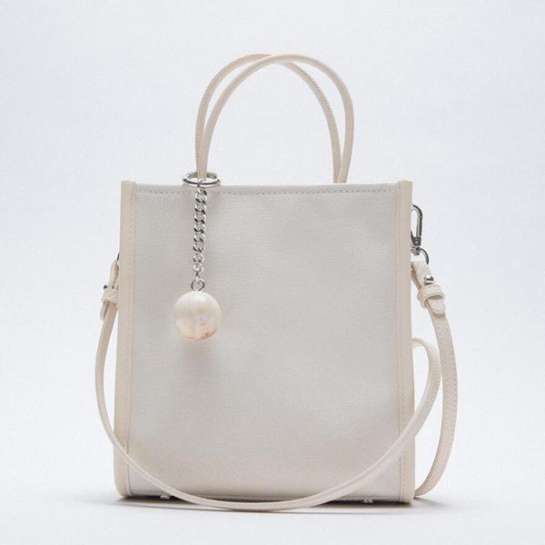 evening bags simple luxury designer shoulder bag large capacity ball pendant beige women's canvas casual shopper tote female handbag
evening bags simple luxury designer shoulder bag large capacity ball pendant beige women's canvas casual shopper tote female handbag
