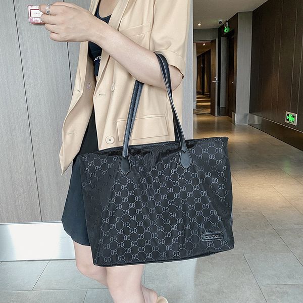 factory direct sale 75% off one shoulder women's new 2021 letter shopping high capacity fashionable korean nylon leisure tote bags
factory direct sale 75% off one shoulder women's new 2021 letter shopping high capacity fashionable korean nylon leisure tote bags