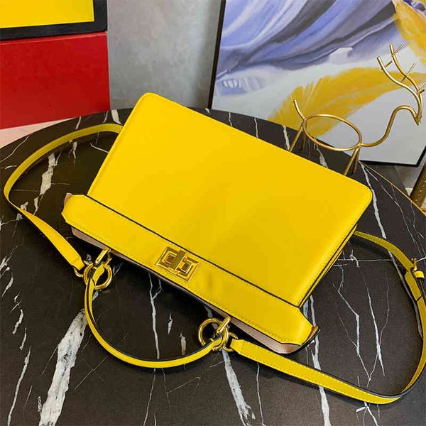 design handbag new fashion all-match leather and metal lock solid color one-shoulder messenger portable organ bag
design handbag new fashion all-match leather and metal lock solid color one-shoulder messenger portable organ bag