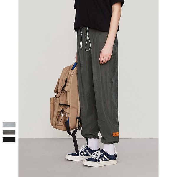 men's pants autumn and winter solid color simple harlan trousers draw rope loosen waist tie feet windbreake, Black
men's pants autumn and winter solid color simple harlan trousers draw rope loosen waist tie feet windbreake, Black