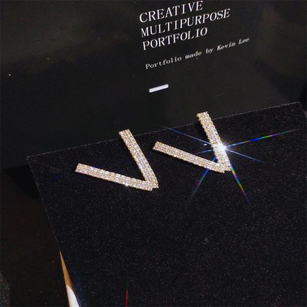 stud arrivals exquisite stereoscopic letter v pattern earrings for women inlaid full shiny crystal zircon jewelry, Golden;silver
stud arrivals exquisite stereoscopic letter v pattern earrings for women inlaid full shiny crystal zircon jewelry, Golden;silver