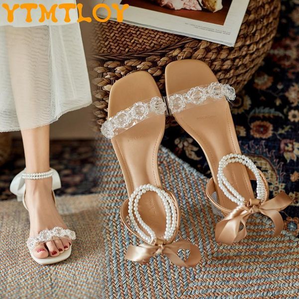sandals french mid-heel pearl strap women's thick heel 2021 summer bow transparent one word with crystal high heels, Black
sandals french mid-heel pearl strap women's thick heel 2021 summer bow transparent one word with crystal high heels, Black