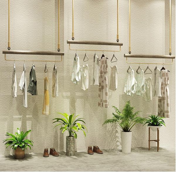 hangers & racks simple retro clothing store display rack ring ceiling high and low women's shelves
hangers & racks simple retro clothing store display rack ring ceiling high and low women's shelves